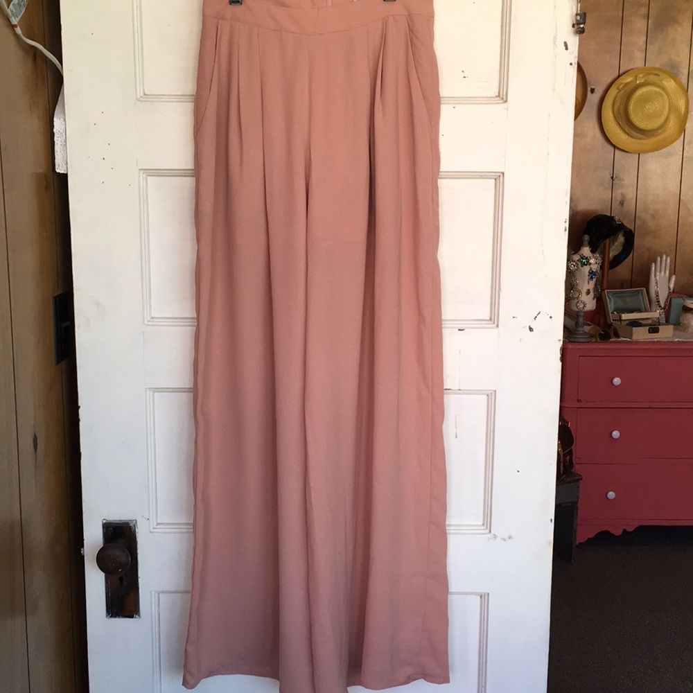 Flared pale peach pant with shorts underneath med.